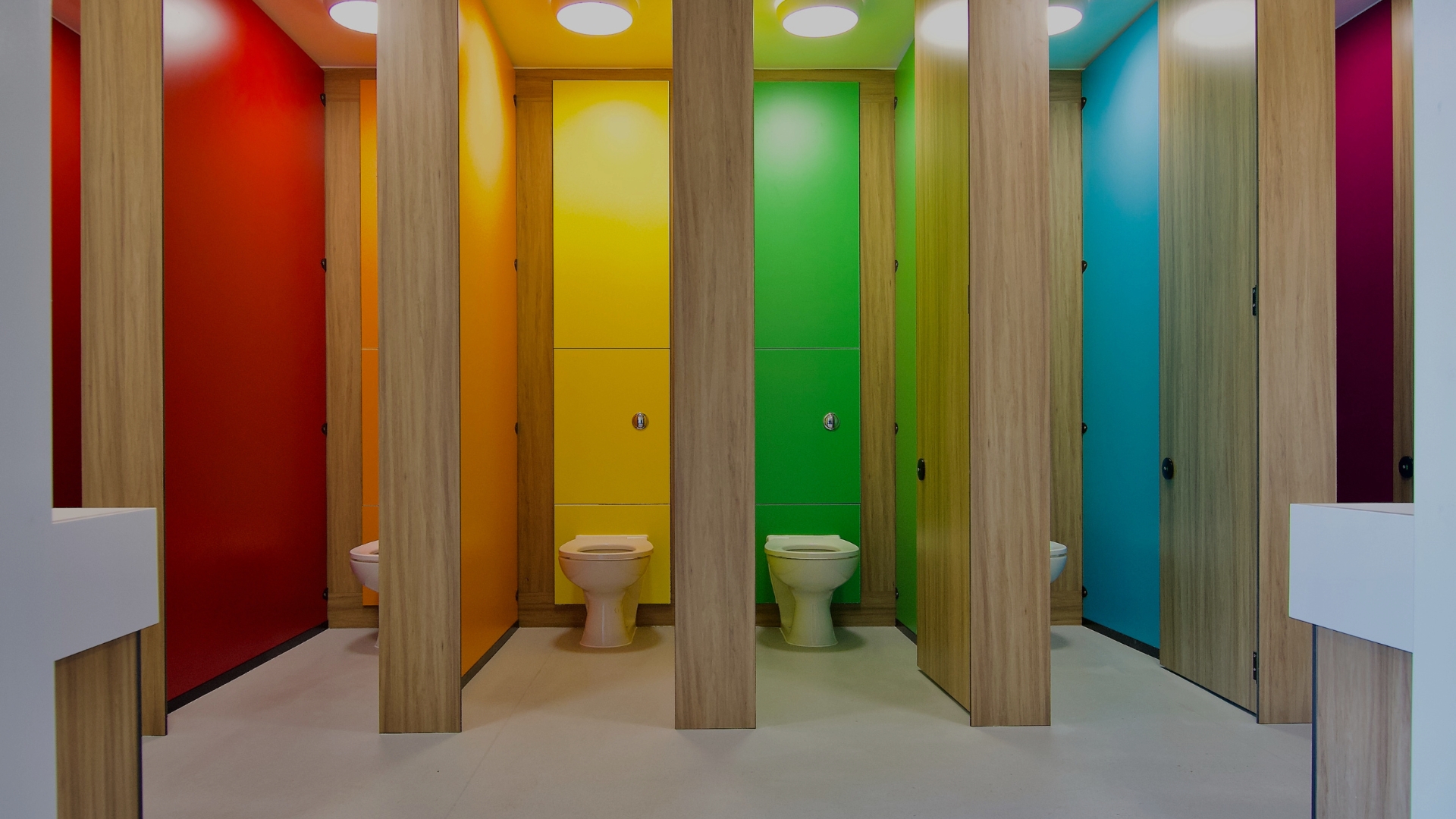 multi-coloured washroom cubicles