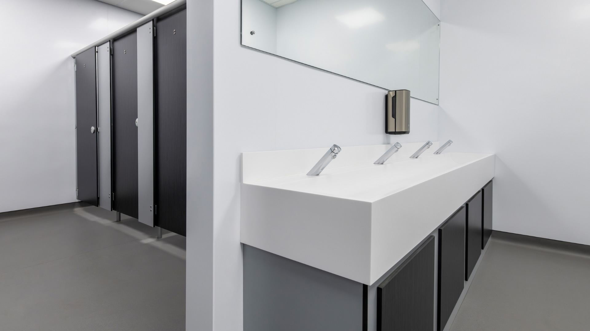 Clean washroom cubicles and sinks